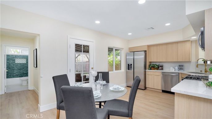Dining room, Interior, Kitchen, Recessed Lighting, Stainless Steel Appliances, Wood Texture Flooring