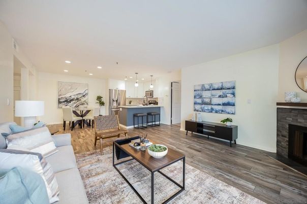 Dining room, Fireplace, Interior, Kitchen, Living room, Pendant Lights, Recessed Lighting, Stainless Steel Appliances, Wood Texture Flooring