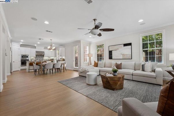 Chandelier, Dining room, Interior, Kitchen, Living room, Recessed Lighting, Stainless Steel Appliances, Wood Texture Flooring