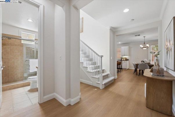 Bathroom, Chandelier, Dining room, Interior, Recessed Lighting, Wood Texture Flooring