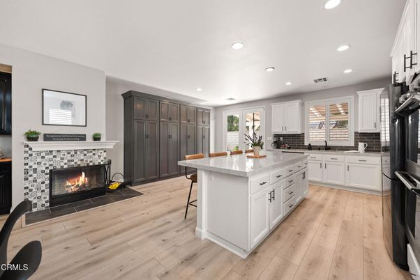 Fireplace, Interior, Kitchen, Recessed Lighting, Wood Texture Flooring