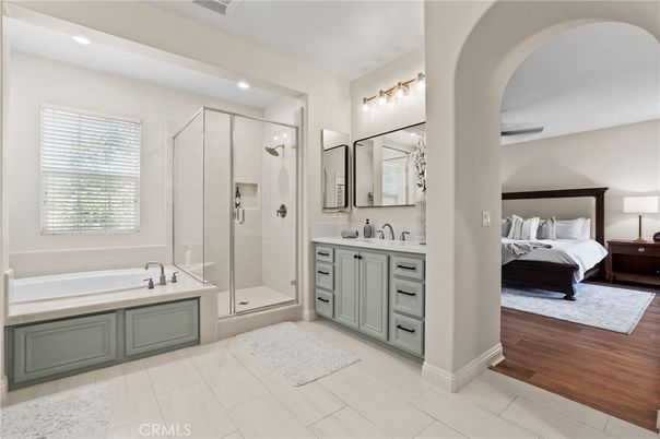 Bathroom, Bedroom, Dual Sink Vanities, Glass Shower, Interior, Recessed Lighting, Wood Texture Flooring