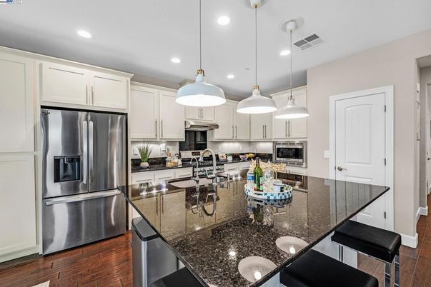 Interior, Kitchen, Pendant Lights, Recessed Lighting, Stainless Steel Appliances, Wood Texture Flooring