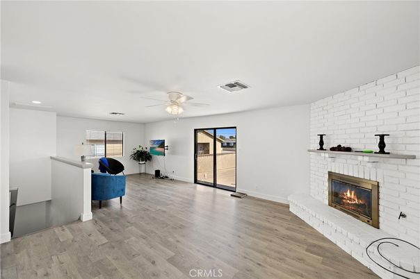 Fireplace, Interior, Recessed Lighting, Stone Walls, Wood Texture Flooring