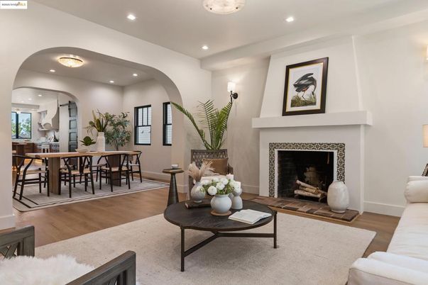 Dining room, Fireplace, Interior, Living room, Recessed Lighting, Wood Texture Flooring