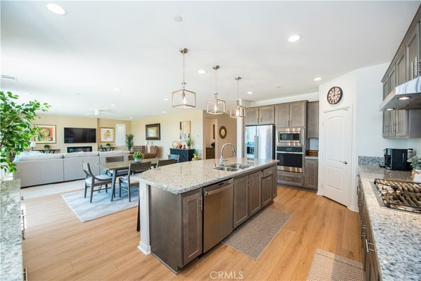 Dining room, Interior, Kitchen, Living room, Pendant Lights, Recessed Lighting, Stainless Steel Appliances, Wood Texture Flooring