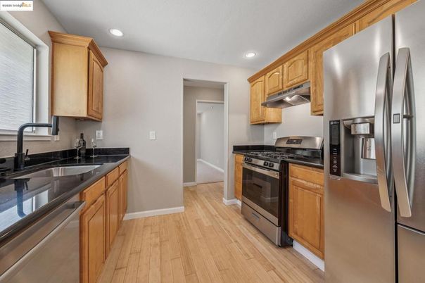 Interior, Kitchen, Recessed Lighting, Stainless Steel Appliances, Wood Texture Flooring
