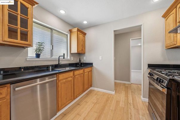 Interior, Kitchen, Recessed Lighting, Stainless Steel Appliances, Wood Texture Flooring