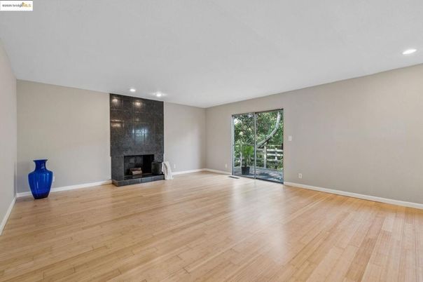 Empty room, Fireplace, Interior, Recessed Lighting, Wood Texture Flooring