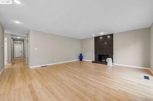 Empty room, Fireplace, Interior, Recessed Lighting, Wood Texture Flooring