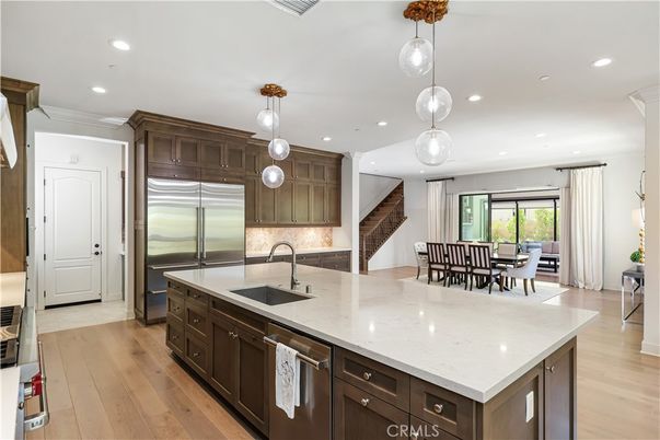 Dining room, Interior, Kitchen, Pendant Lights, Recessed Lighting, Stainless Steel Appliances, Wood Texture Flooring