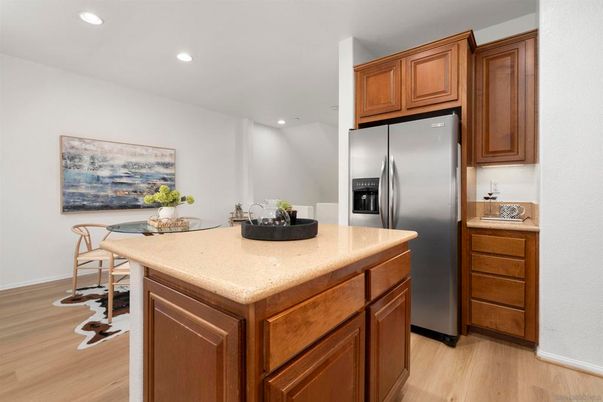 Dining room, Interior, Kitchen, Recessed Lighting, Stainless Steel Appliances, Wood Texture Flooring