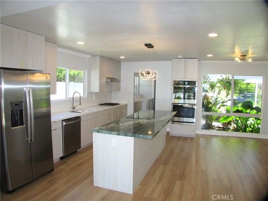 Interior, Kitchen, Pendant Lights, Recessed Lighting, Stainless Steel Appliances, Wood Texture Flooring