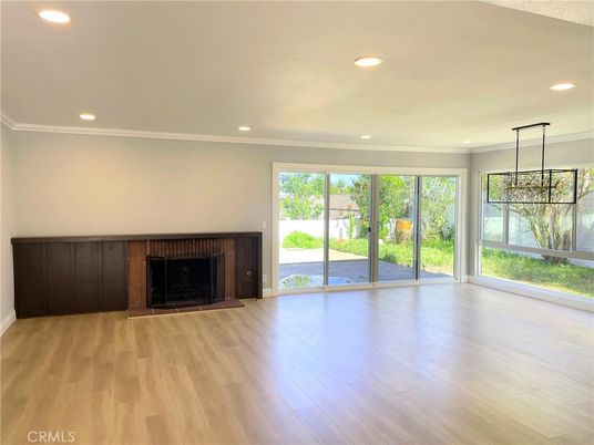 Empty room, Fireplace, Interior, Pendant Lights, Recessed Lighting, Wood Texture Flooring