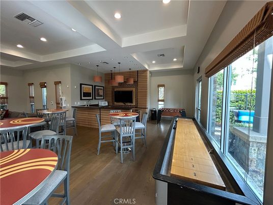 Dining room, Fireplace, Interior, Living room, Pendant Lights, Recessed Lighting, Stone Walls, Wood Texture Flooring