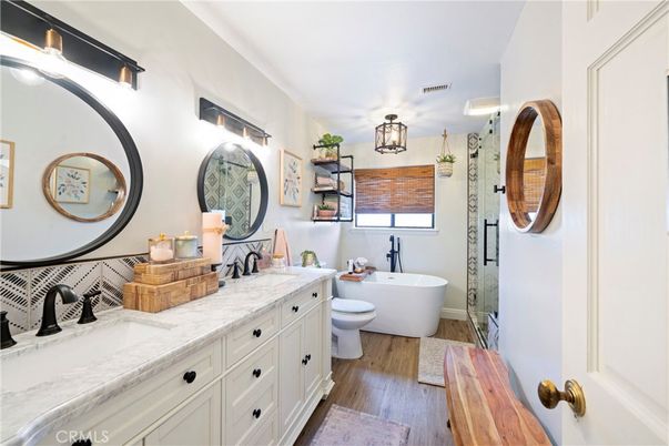 Bathroom, Dual Sink Vanities, Free Standing Baths, Interior, Wood Texture Flooring