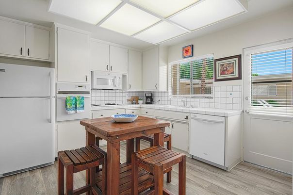 Interior, Kitchen, Tile Countertops, Wood Texture Flooring
