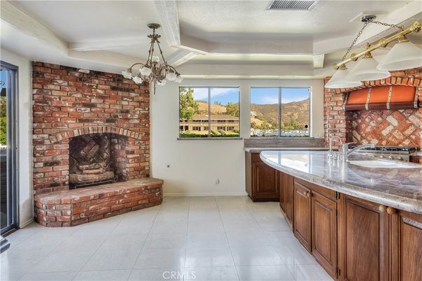 Chandelier, Fireplace, Interior, Kitchen, Pendant Lights, Stone Walls