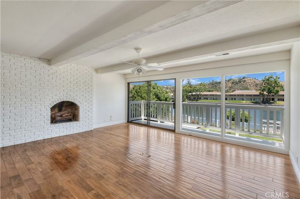 Empty room, Fireplace, Interior, Stone Walls, Water, Wood Texture Flooring