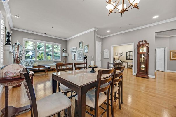 Chandelier, Dining room, Fireplace, Interior, Living room, Recessed Lighting, Wood Texture Flooring