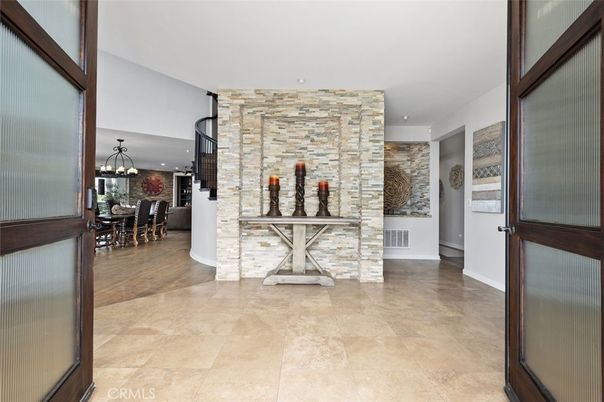 Chandelier, Dining room, Interior, Pendant Lights, Stone Walls, Wine Storage, Wood Texture Flooring