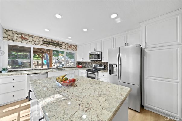Interior, Kitchen, Recessed Lighting, Stainless Steel Appliances, Stone Walls, Wood Texture Flooring