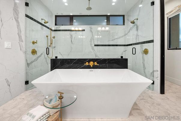Bathroom, Free Standing Baths, Glass Shower, Interior, Marble, Marble Walls, Recessed Lighting