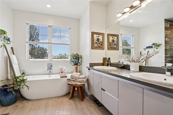 Bathroom, Dual Sink Vanities, Free Standing Baths, Interior, Recessed Lighting, Wood Texture Flooring