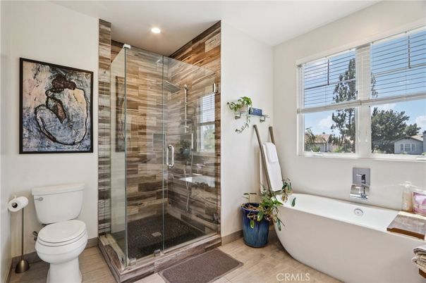 Bathroom, Free Standing Baths, Glass Shower, Interior, Recessed Lighting, Wood Texture Flooring