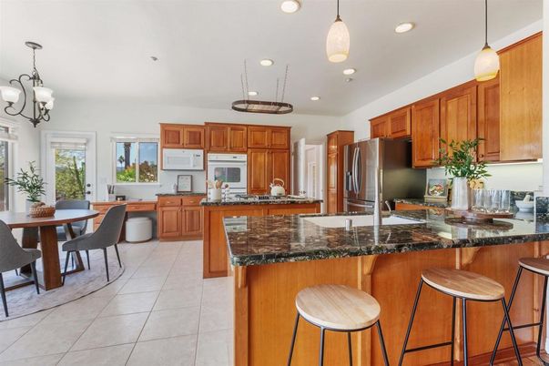 Chandelier, Dining room, Interior, Kitchen, Pendant Lights, Recessed Lighting, Stainless Steel Appliances