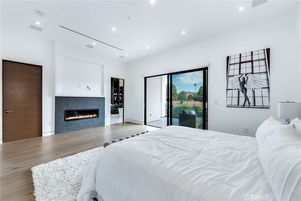 Bedroom, Fireplace, Interior, Recessed Lighting, Wood Texture Flooring