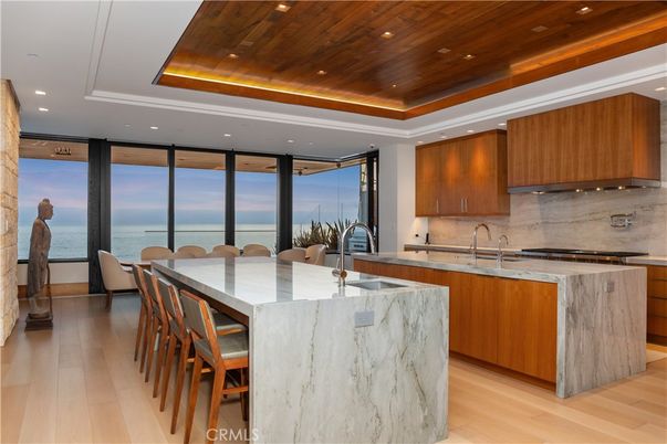 Dining room, Interior, Kitchen, Recessed Lighting, Stainless Steel Appliances, Water, Wooden Ceilings, Wood Texture Flooring