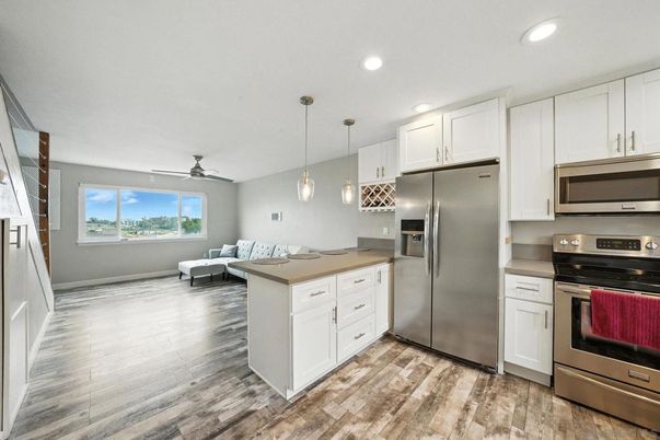 Interior, Kitchen, Living room, Pendant Lights, Recessed Lighting, Stainless Steel Appliances, Wood Texture Flooring