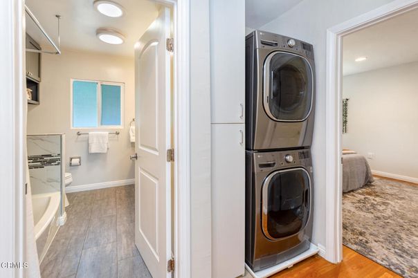 Bathroom, Interior, Recessed Lighting, Utility Closets, Washer, Wood Texture Flooring