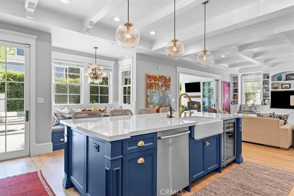 Chandelier, Interior, Kitchen, Living room, Pendant Lights, Recessed Lighting, Stainless Steel Appliances, Wood Texture Flooring