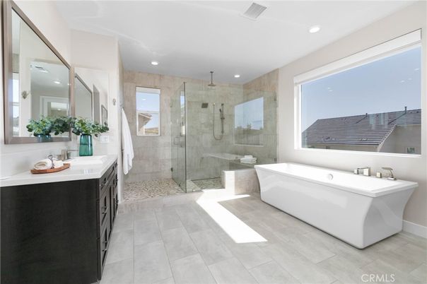Bathroom, Dual Sink Vanities, Free Standing Baths, Glass Shower, Interior, Marble Walls, Recessed Lighting
