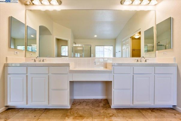 Bathroom, Dual Sink Vanities, Interior, Recessed Lighting, Tile Countertops