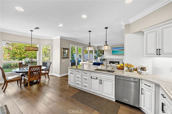 Dining room, Interior, Kitchen, Pendant Lights, Recessed Lighting, Stainless Steel Appliances, Wood Texture Flooring