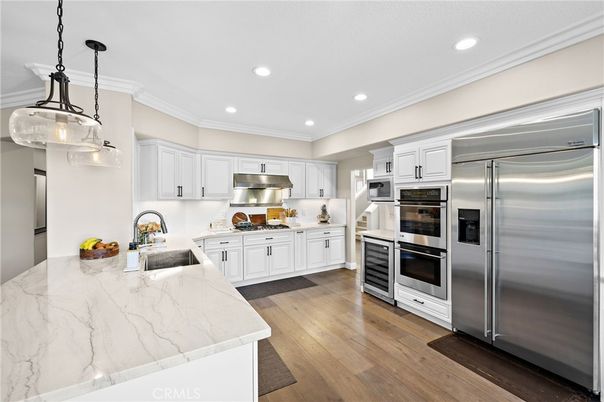 Interior, Kitchen, Pendant Lights, Recessed Lighting, Stainless Steel Appliances, Wood Texture Flooring