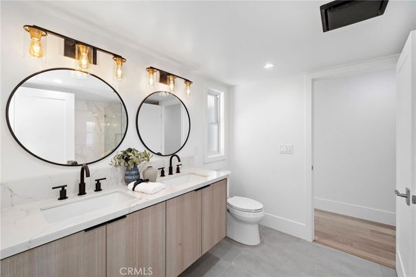 Bathroom, Dual Sink Vanities, Interior, Recessed Lighting, Wood Texture Flooring