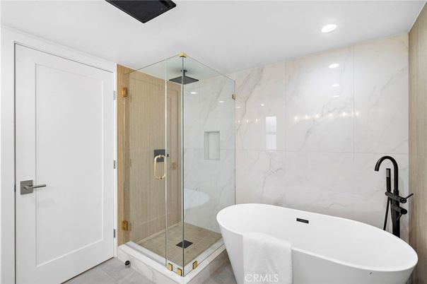 Bathroom, Free Standing Baths, Glass Shower, Interior, Marble Walls, Recessed Lighting