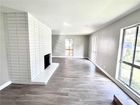 Empty room, Fireplace, Interior, Recessed Lighting, Wood Texture Flooring