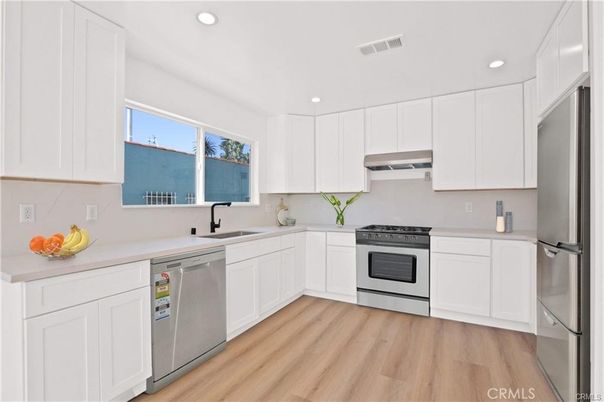 Interior, Kitchen, Recessed Lighting, Stainless Steel Appliances, Wood Texture Flooring