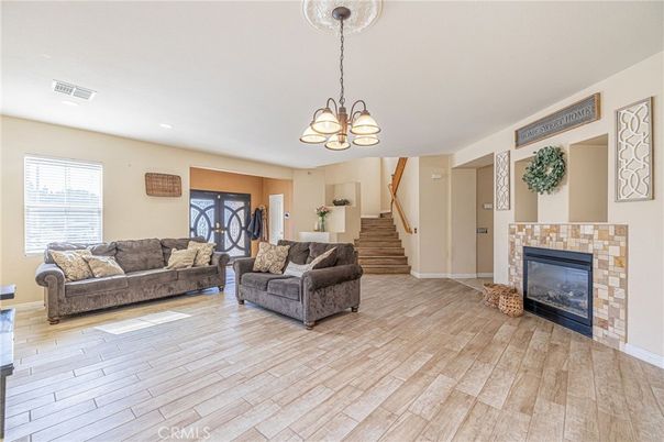 Chandelier, Fireplace, Interior, Living room, Recessed Lighting, Wood Texture Flooring