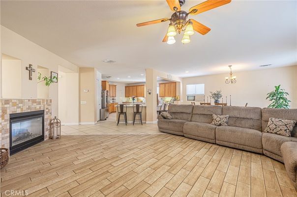 Chandelier, Dining room, Fireplace, Interior, Kitchen, Living room, Recessed Lighting, Wood Texture Flooring