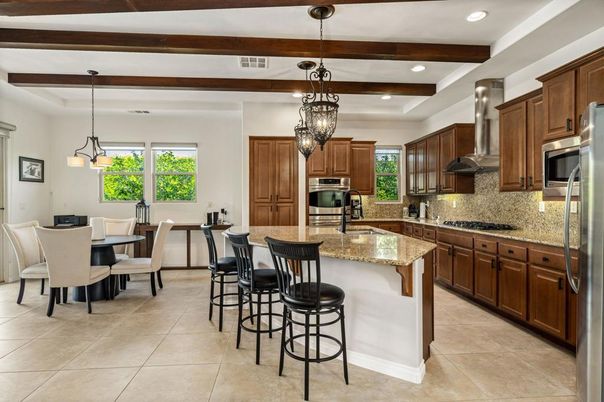 Chandelier, Dining room, Interior, Kitchen, Pendant Lights, Recessed Lighting, Stainless Steel Appliances, Wooden Beams