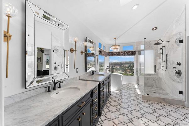 Bathroom, Chandelier, Dual Sink Vanities, Free Standing Baths, Glass Shower, Interior, Marble Walls, Recessed Lighting