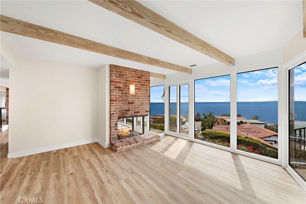 Empty room, Fireplace, Interior, Stone Walls, Water, Wooden Beams, Wood Texture Flooring