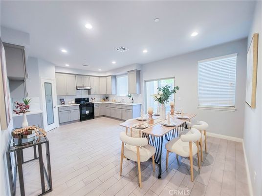 Dining room, Interior, Kitchen, Recessed Lighting, Stainless Steel Appliances, Wood Texture Flooring
