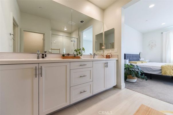 Bathroom, Bedroom, Dual Sink Vanities, Glass Shower, Interior, Recessed Lighting, Wood Texture Flooring